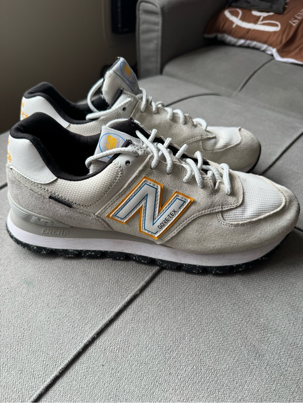 New Balance Men's Light Gray Suede & Mesh Sneakers with Yellow & Blue Accents